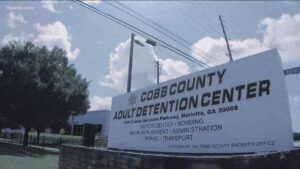 Cobb County Adult Detention Center sign at 1825 County Services Parkway, Marietta, GA