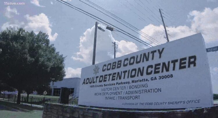 Cobb County Adult Detention Center sign.