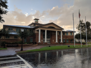 Exterior of a court building in Smyrna, Georgia, on a rainy day, highlighting the local focus of A 24 Hour Bail Bonding services.