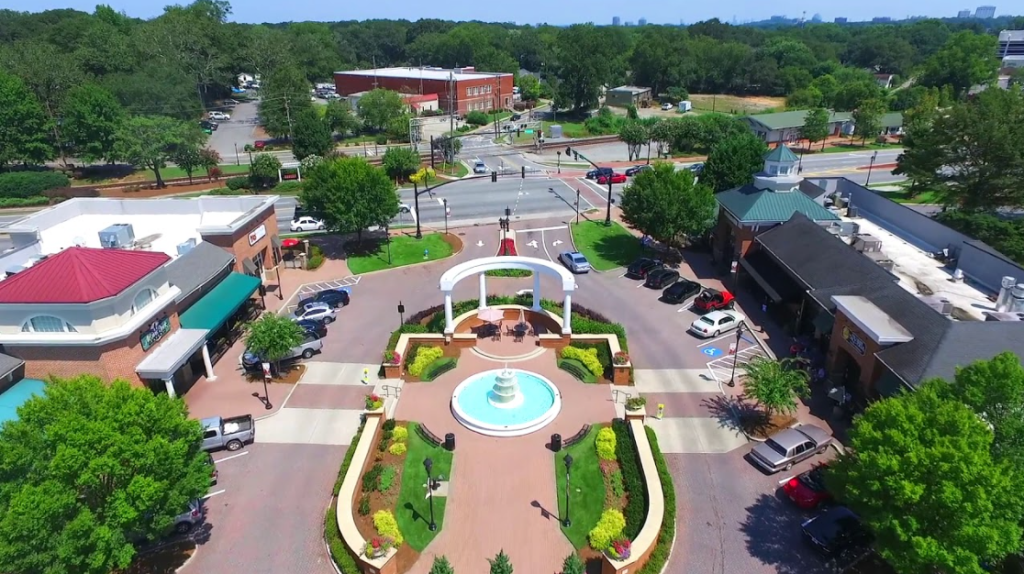 Aerial view of Smyrna, GA, featuring a central fountain and surrounding buildings – representing the local community served by A 24 Hour Bail Bonding.