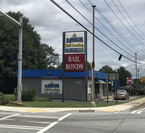A 24 Hour Bail Bonding office and signage at 2248 Austell Rd SW in Marietta, GA