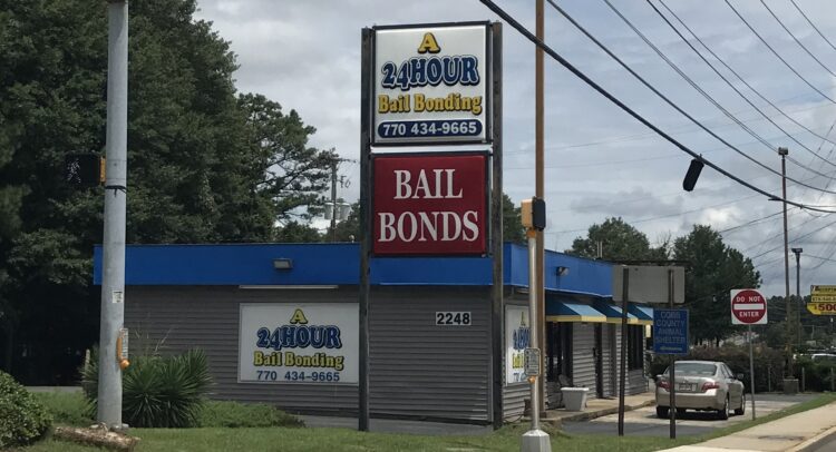 A 24 Hour Bail Bonding office and signage at 2248 Austell Rd SW in Marietta, GA